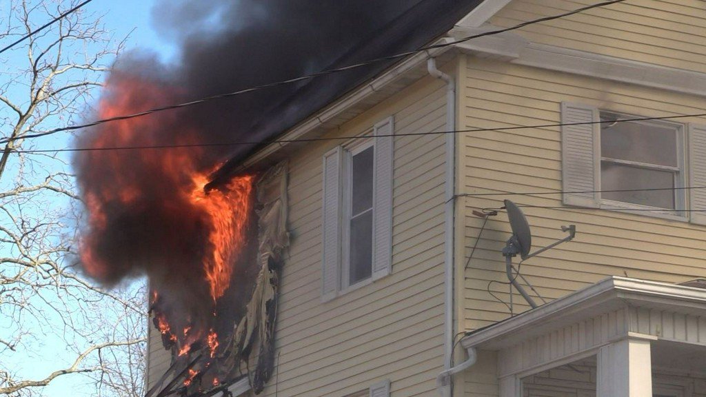 When a fire broke out in New Castle on Sunday afternoon, a neighbor stepped into action rescuing two dogs from the blaze. A call came in around 4:30 p.m. for a house on fire on the 1400 block of Jackson Ave in New Castle.