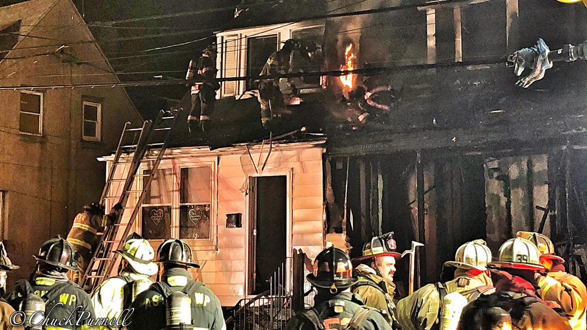 An early morning three-alarm fire in Chester, Delaware County has displaced 12 people, including children, from four separate homes. Firefighters received the first call about the fire on the 1100 block of Remington Street around 12:40 a.m. Thursday.