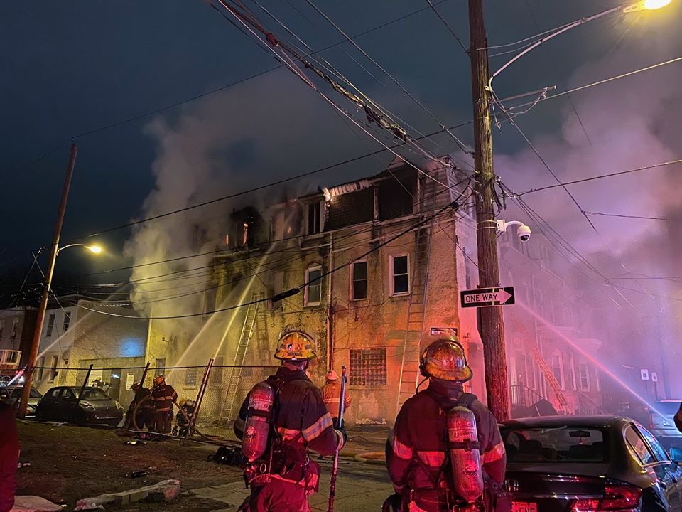 Philadelphia firefighters battle a rowhome fire on N. 35th St. in Mantua early this morning. 