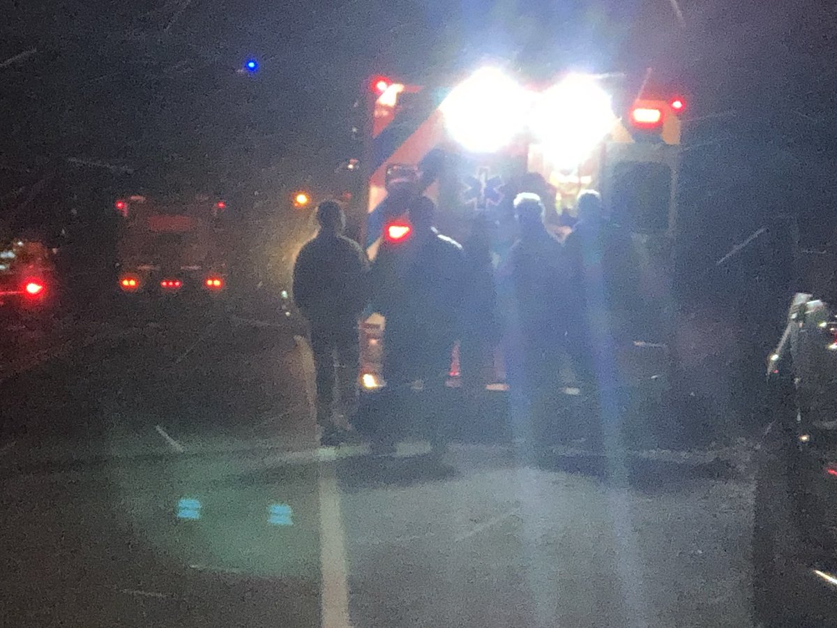 FATAL FIRE IN Mt Pleasant: on Route 31 next to Beacon Road—where emergency sources say coroner was called to a fatal fire. Someone was trapped inside.  This ambulance has a large group of people who walked away from street where fire happened. 