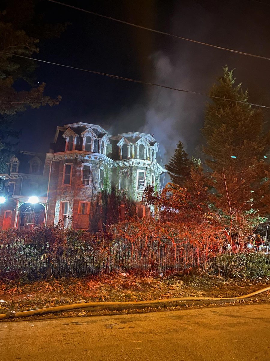 Philadelphia, Pennsylvania. Musgrave St & Locust Ave providing rehab at this dwelling fire