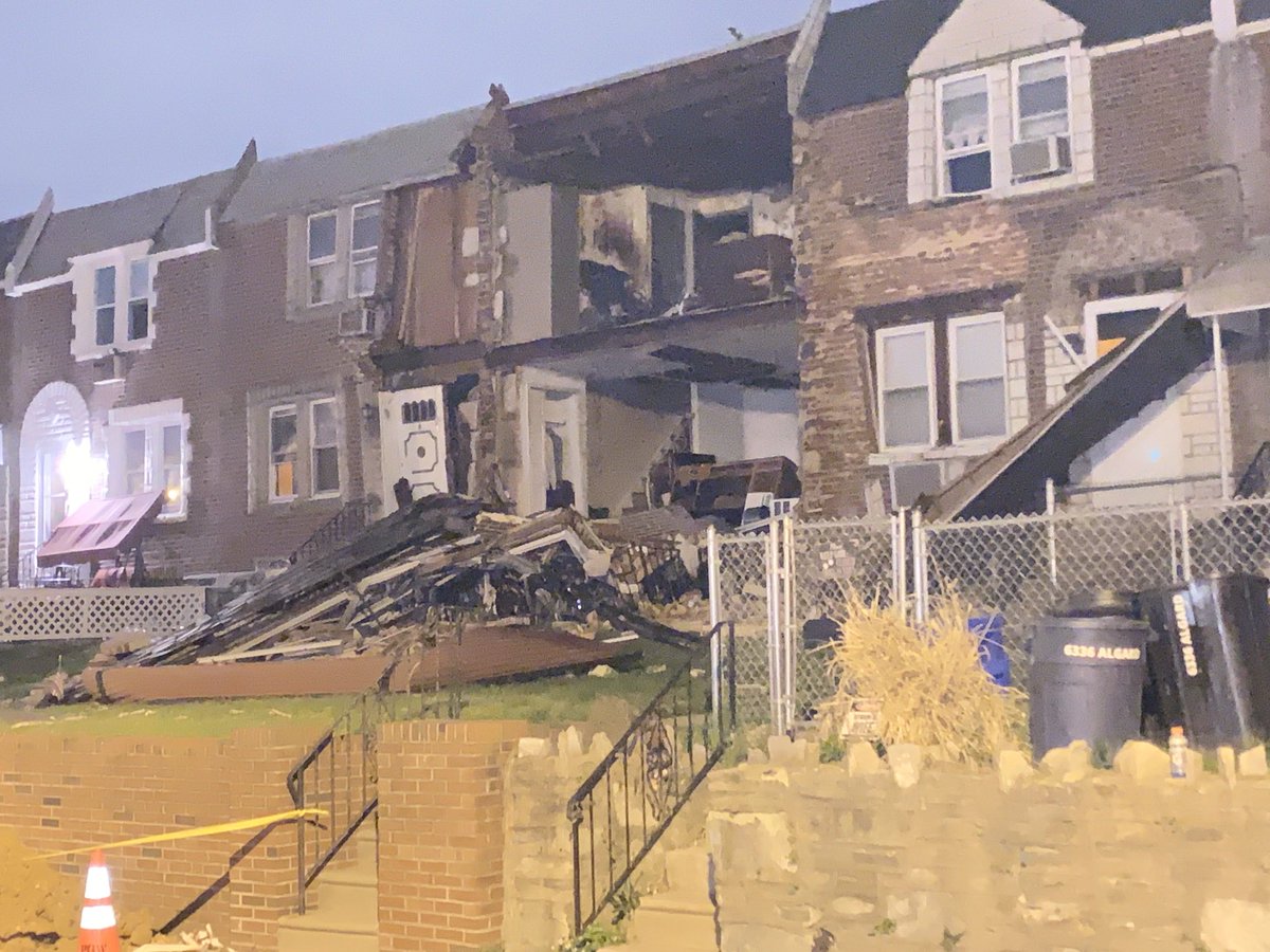 An explosion rips the front off of a Wissinoming row home. 