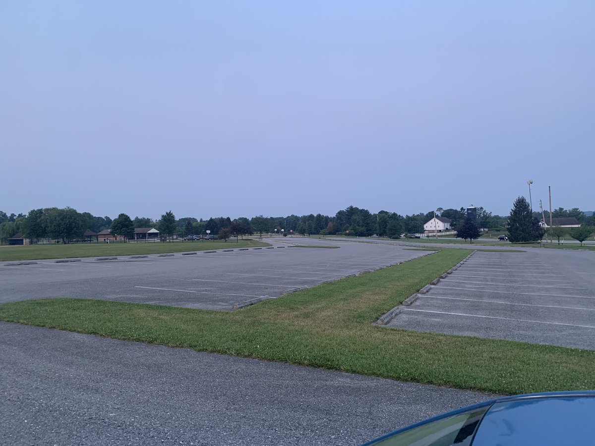 Fatal shooting investigation underway at Cousler Park. Investigators are clearly looking for/processing evidence in a parking lot/ basketball court area