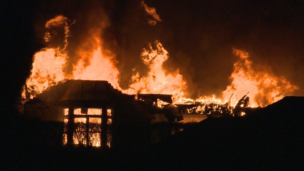 Westmoreland County 911 confirms a firefighter was taken to a local hospital after responding to a 2-alarm fire in Hempfield Township. Dispatchers said the roof is partially collapsed. 