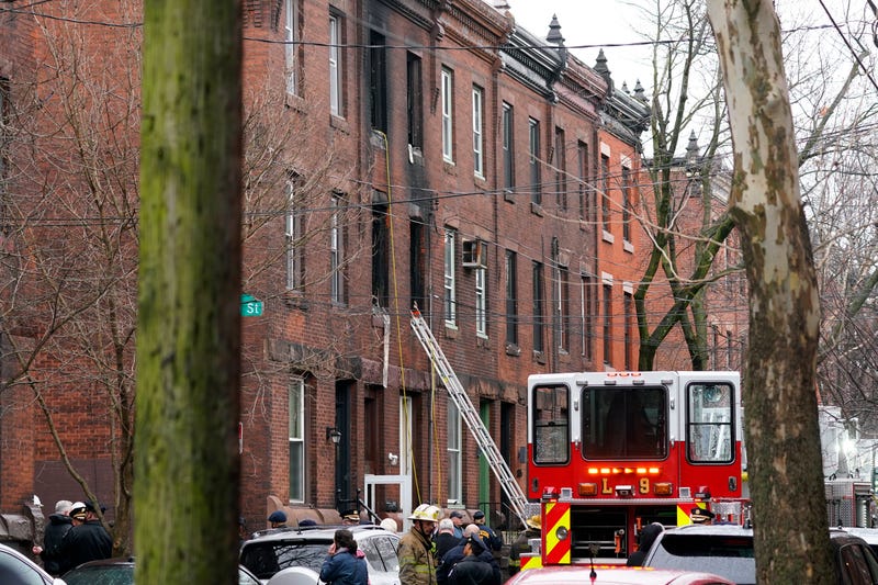 Philadelphia fire kills at least 13, including 7 children. They warned the numbers could grow as firefighters inspected the rowhome, where officials said 26 people had been staying.