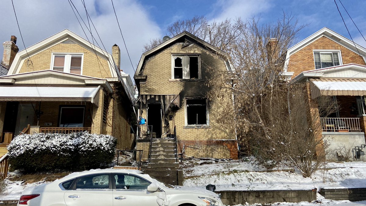 Aftermath of an overnight house fire on Sebring Ave. Two injured