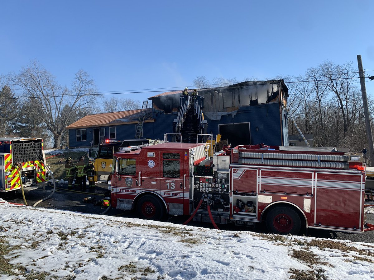 Scene of a fire On Sandy Mount Road and Letterkenny Twp. A mayday was called during the fire for a FF that fell through the steps. His condition is unknown at this time.