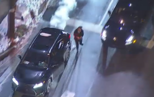 Woman carjacked on camera during wild police chase starting in N Philly. @SkyForce10 overhead as suspect ditches one car & drags the woman out of her SUV before crashing and trying to run from @PhillyPolice.