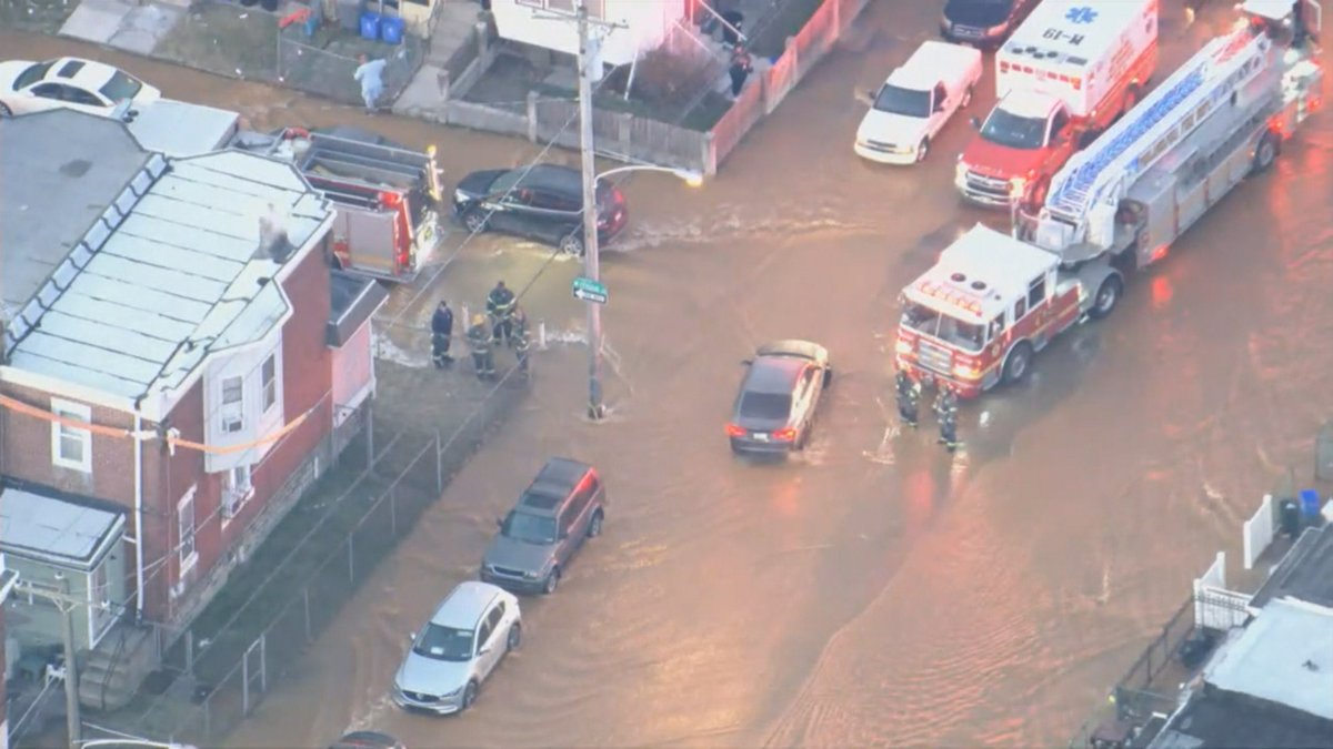 A major water main break in Philadelphia's Kingsessing section Wednesday morning has flooded an intersection and it appears water is seeping into some homes