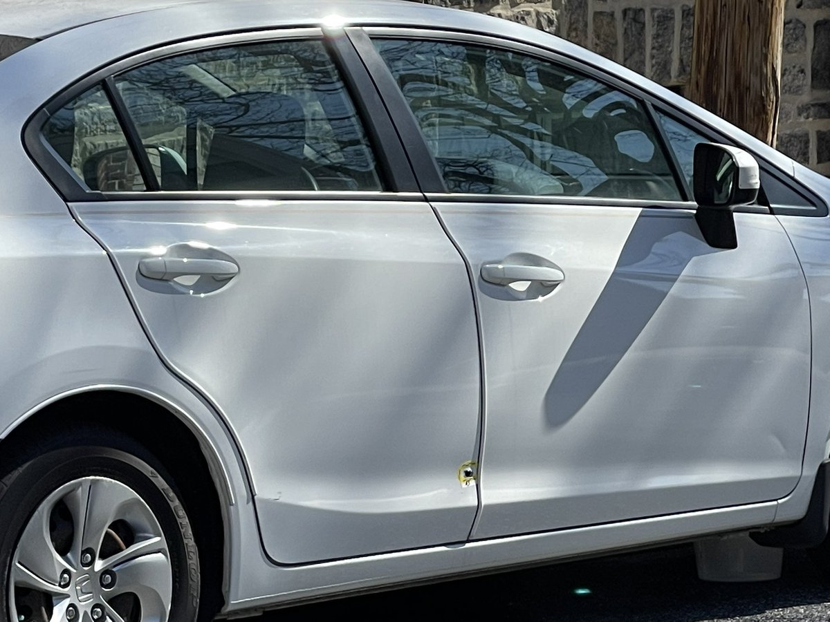 Philly Police exchanged gunfire. A 12-year-old, who officers say was seen with a gun, was shot in his back, killing him.   Neighbors say the shooting left bullet holes in two parked cars 