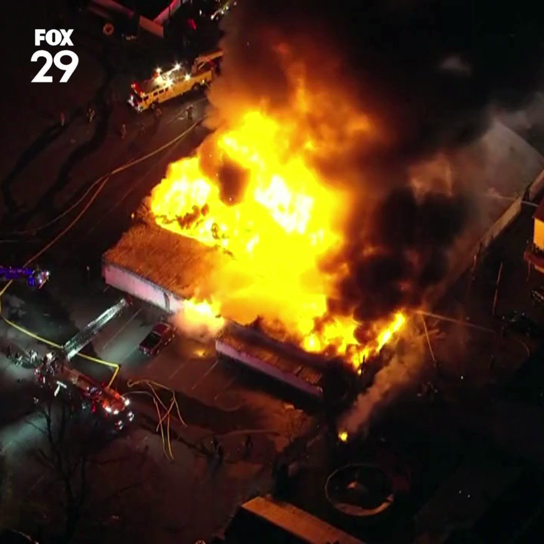 SKYFOX is over the scene of an active fire at Levittown Lanes as firefighters work to stop it from spreading to homes and buildings in the area.