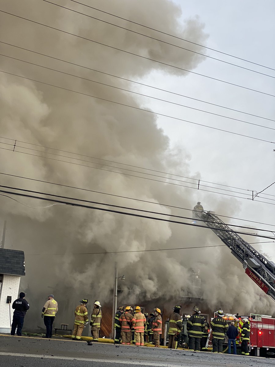 A loss for the Levittown community, firefighters are working to extinguish the 3-alarm fire here at Levittown Lanes. @6abc   Thick smoke is billowing out of the building, officials say the fire is threatening neighboring properties