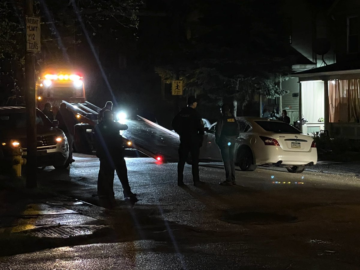 Police say a man who lives in this white house on N 3rd St. shot his gf in that white car.   She's in stable condition.   Police are now searching for the man. They say he's not a threat to the public.   They are towing the car.