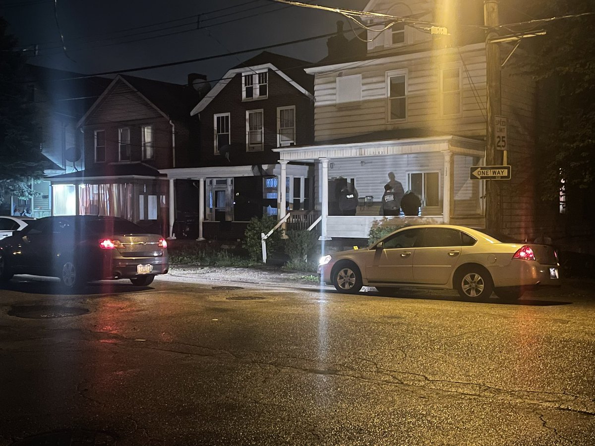 Police say a man who lives in this white house on N 3rd St. shot his gf in that white car.   She's in stable condition.   Police are now searching for the man. They say he's not a threat to the public.   They are towing the car.