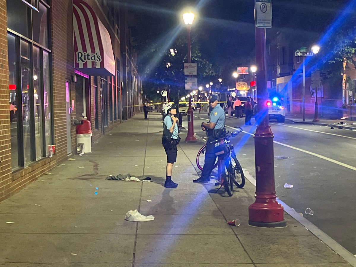 Saturday night in Philadelphia. A mass shooting on 4th & South Street with reports of nearly a dozen people shot. I'm on scene where police have cordoned off the popular weekend strip, a trail of what appears to be blood snaking along the sidewalk in front of a Rita's Water Ice