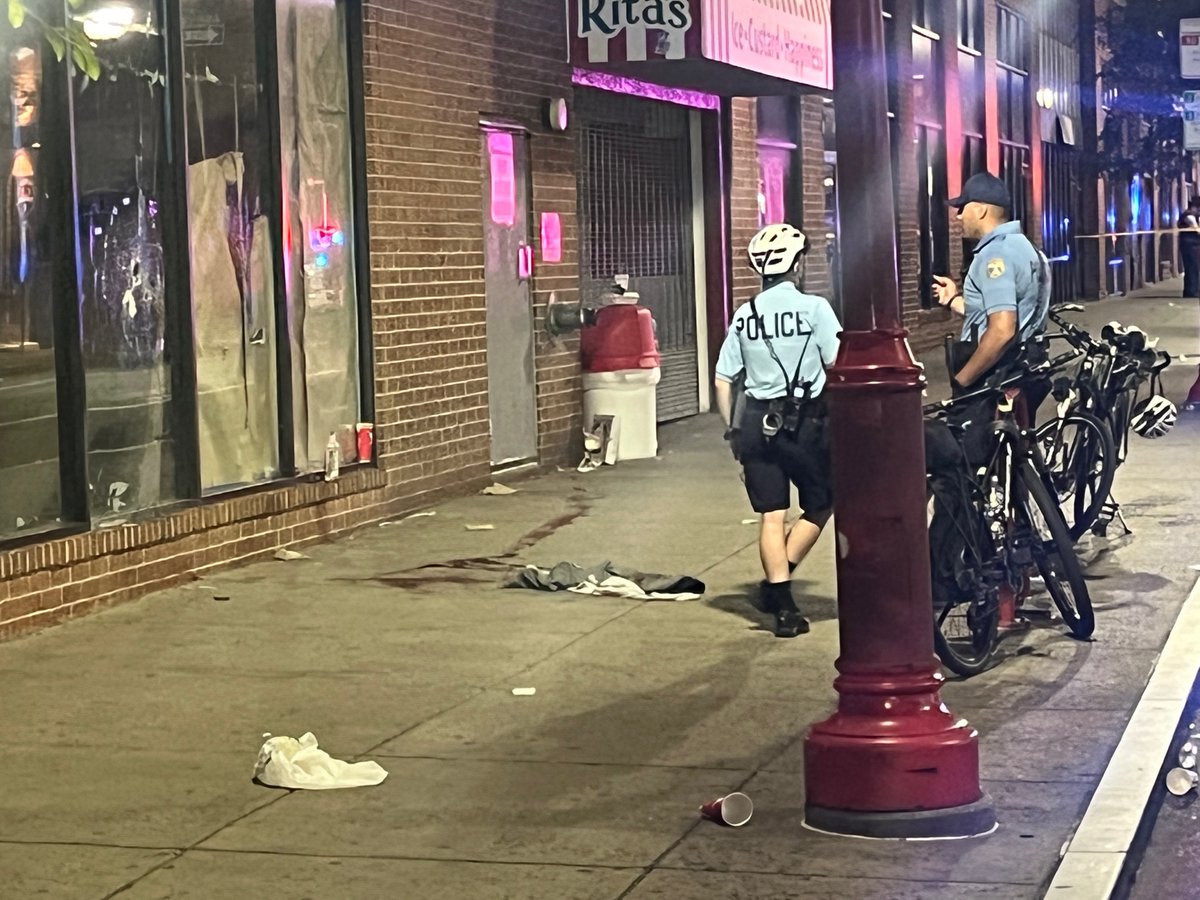 Saturday night in Philadelphia. A mass shooting on 4th & South Street with reports of nearly a dozen people shot. I'm on scene where police have cordoned off the popular weekend strip, a trail of what appears to be blood snaking along the sidewalk in front of a Rita's Water Ice