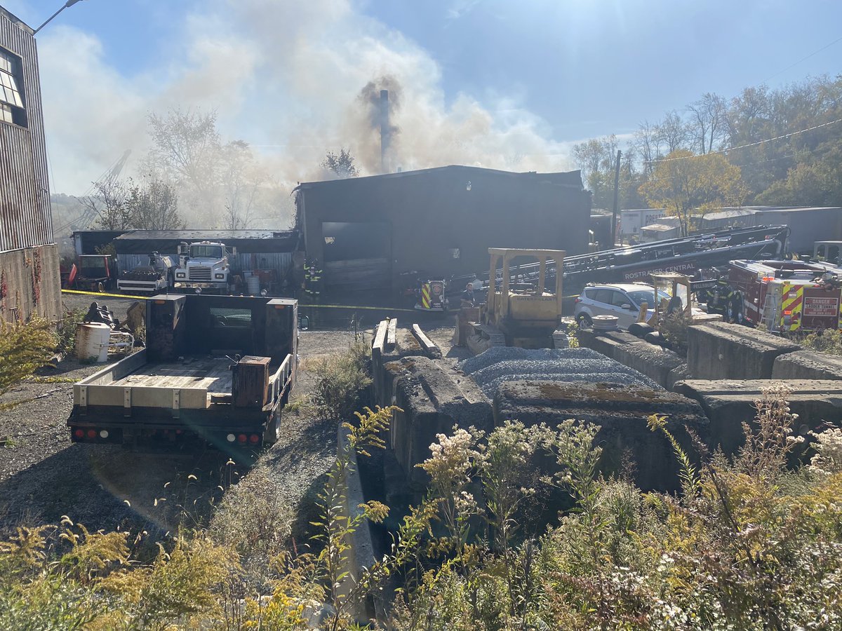 Building fire in Forward Twp. Police on scene tell there's excavating equipment inside. smoke and a lot of water now surrounding the building