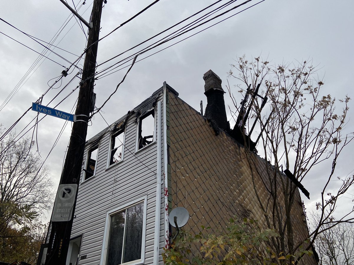 Massive flames ripped through a duplex on Iona St in Pittsburgh's Spring Hill neighborhood last night. Neighbors say one side was abandoned and a woman living in the other side was helped to safety