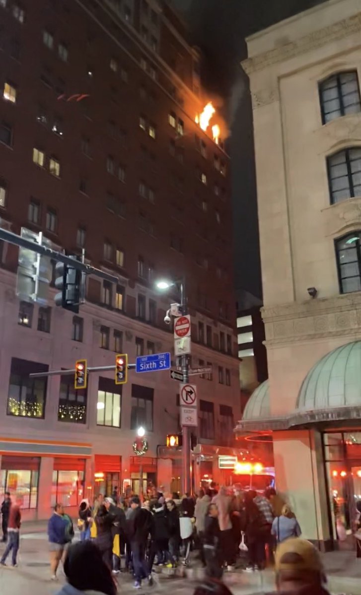 Flames shooting out of the Roosevelt Bldg on Penn Ave Downtown overnight. 100+ people forced out of the apartment bldg. Fire chief says one person was killed, another in critical condition.