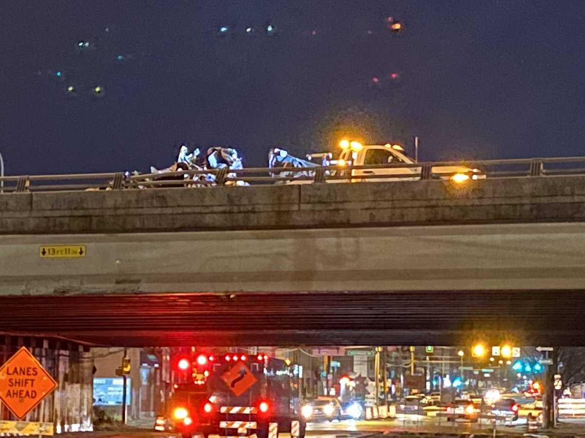 crews are towing away two wrecked vehicles involved in a deadly crash overnight on I-95 Northbound near Port Richmond. 