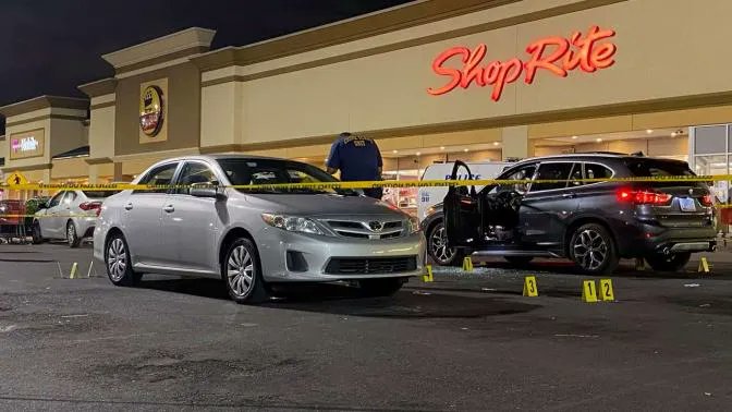 Philadelphia Police were investigating a shooting in the parking lot of a shopping center in Olney last night
