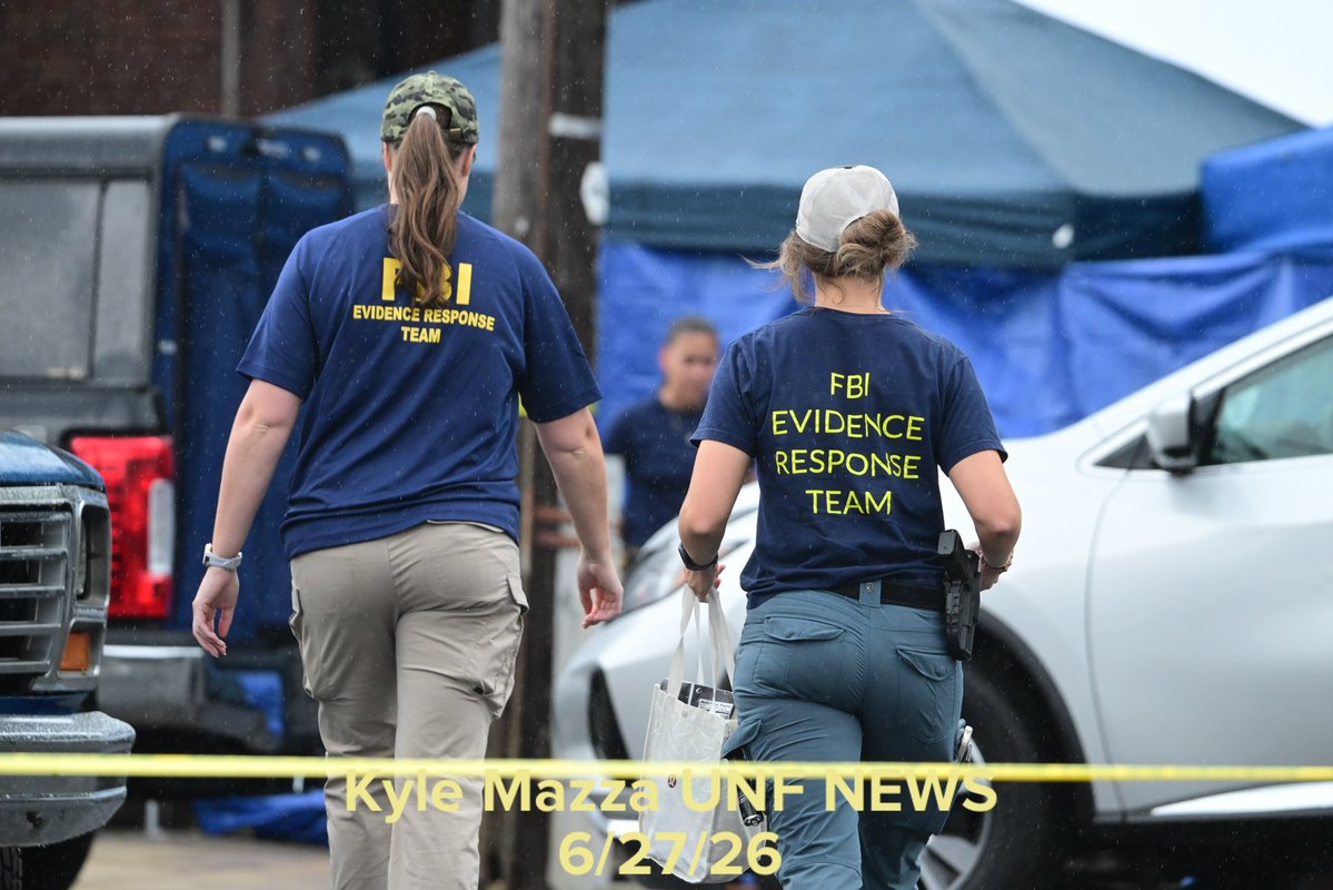 FBI agents collect evidence as they raid a home on the 400 block of West Chew Avenue in the Olney neighborhood in Philadelphia, Pennsylvania, United States on Saturday, June 27, 2026. Multiple law enforcement agencies, including Philadelphia police homicide detectives and the FBI, are conducting an investigation after chemicals, ammunition and drugs were found inside a home in Olney. 44-year-old Eugene Horsch is in custody on drug and firearms charges.