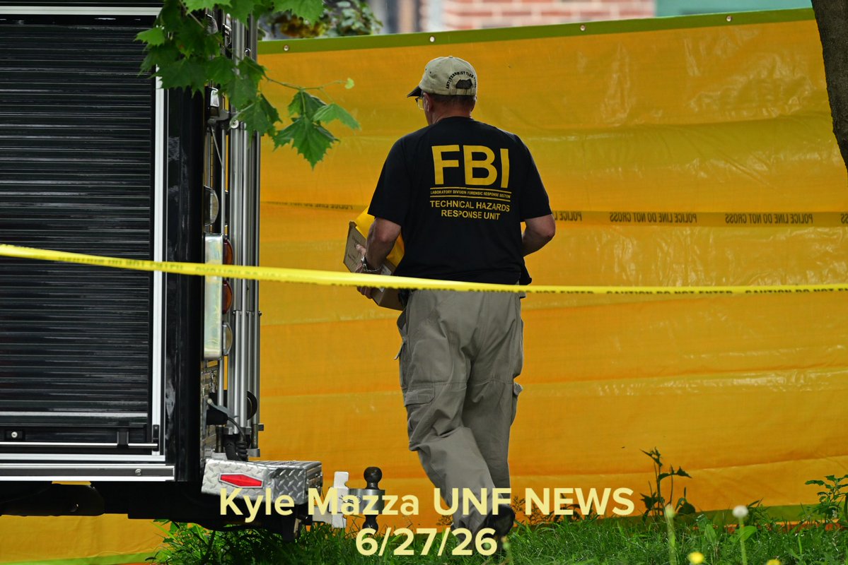 FBI agents collect evidence as they raid a home on the 400 block of West Chew Avenue in the Olney neighborhood in Philadelphia, Pennsylvania, United States on Saturday, June 27, 2026. Multiple law enforcement agencies, including Philadelphia police homicide detectives and the FBI, are conducting an investigation after chemicals, ammunition and drugs were found inside a home in Olney. 44-year-old Eugene Horsch is in custody on drug and firearms charges.