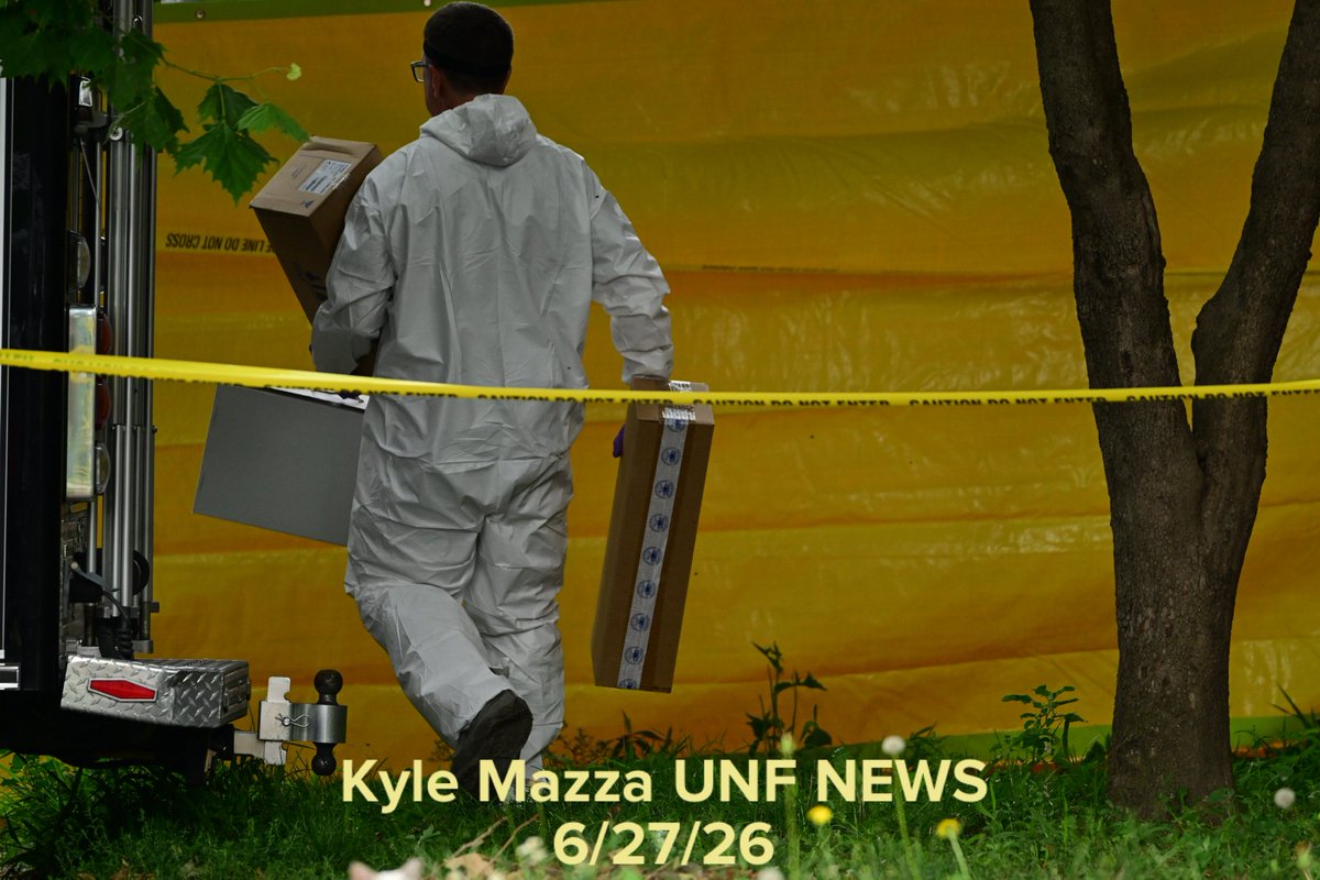 FBI agents collect evidence as they raid a home on the 400 block of West Chew Avenue in the Olney neighborhood in Philadelphia, Pennsylvania, United States on Saturday, June 27, 2026. Multiple law enforcement agencies, including Philadelphia police homicide detectives and the FBI, are conducting an investigation after chemicals, ammunition and drugs were found inside a home in Olney. 44-year-old Eugene Horsch is in custody on drug and firearms charges.
